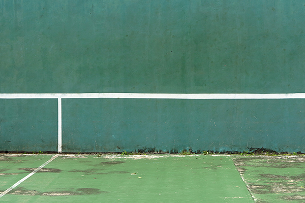 Dirty concrete tennis court